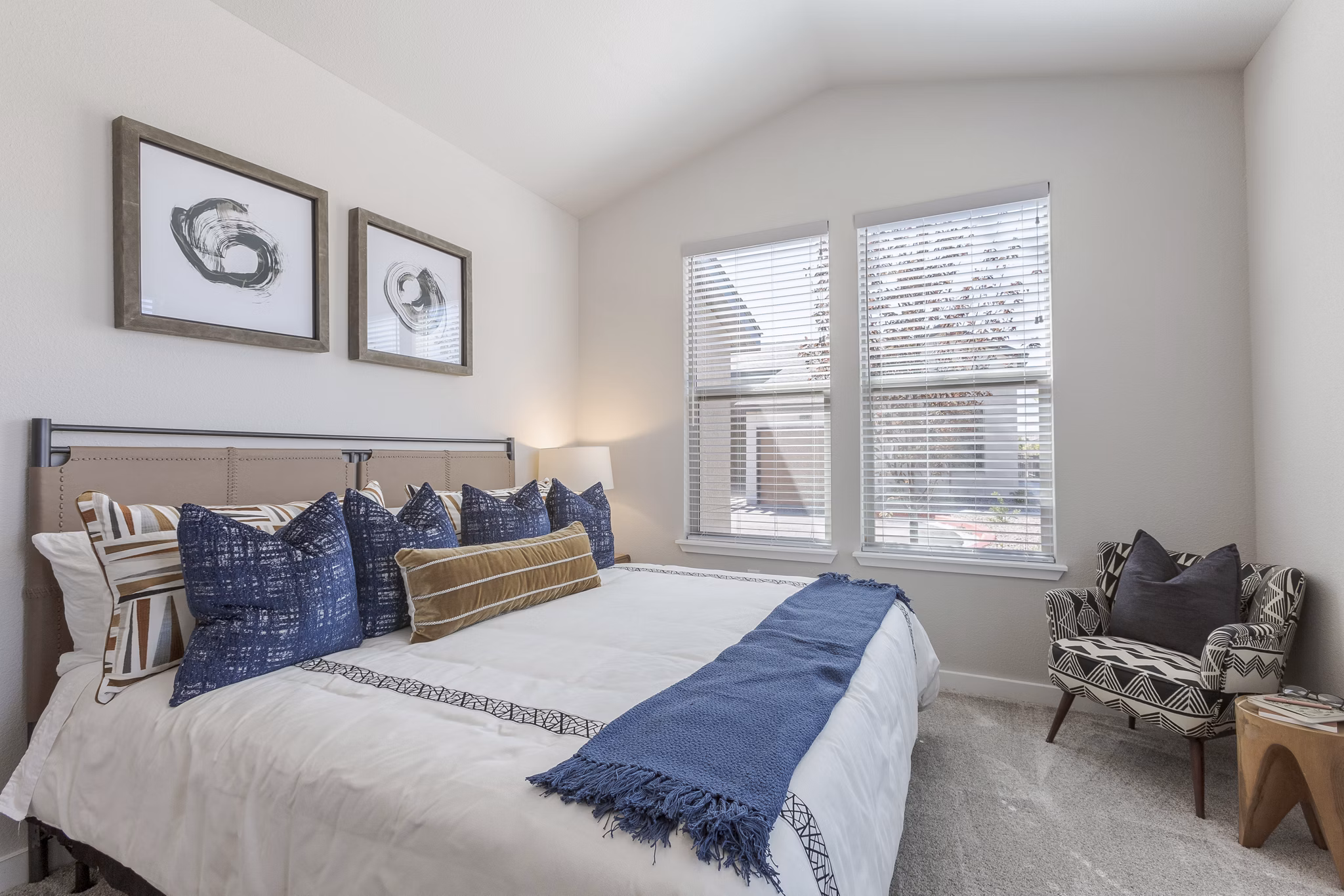 Elegant bedroom with modern decor at Overture Andalucia Apartments, a Greystar luxury property in Albuquerque, NM.