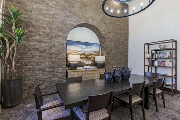 Dining area featuring modern decor and elegant lighting at Overture Andalucia Apartments