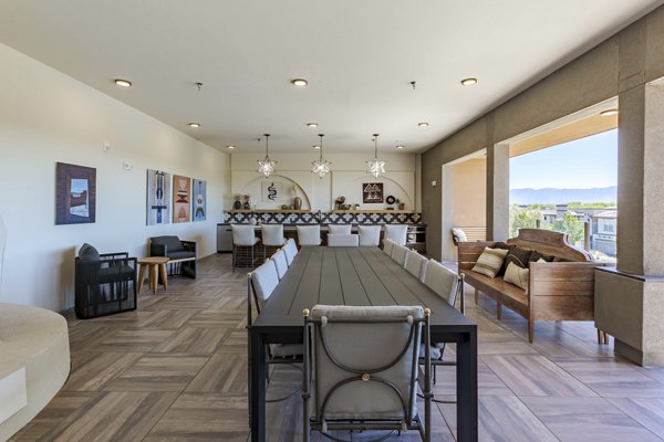 Dining area featuring modern decor and elegant lighting at Overture Andalucia Apartments for luxurious living