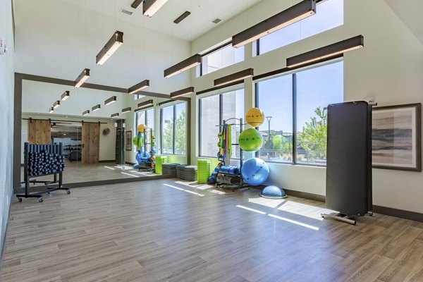 State-of-the-art fitness center at Overture Andalucia Apartments featuring modern equipment and spacious workout areas