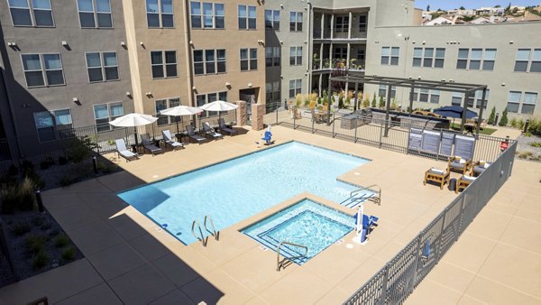 Sparkling outdoor pool at Overture Andalucia Apartments, perfect for relaxation and leisure activities