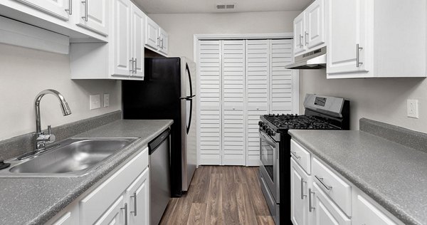 Kitchen with stainless steel appliances in Somerset at the Crossings Apartments