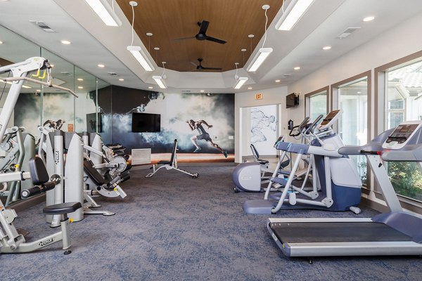 fitness center at The Trails at Canyon Creek Apartments 