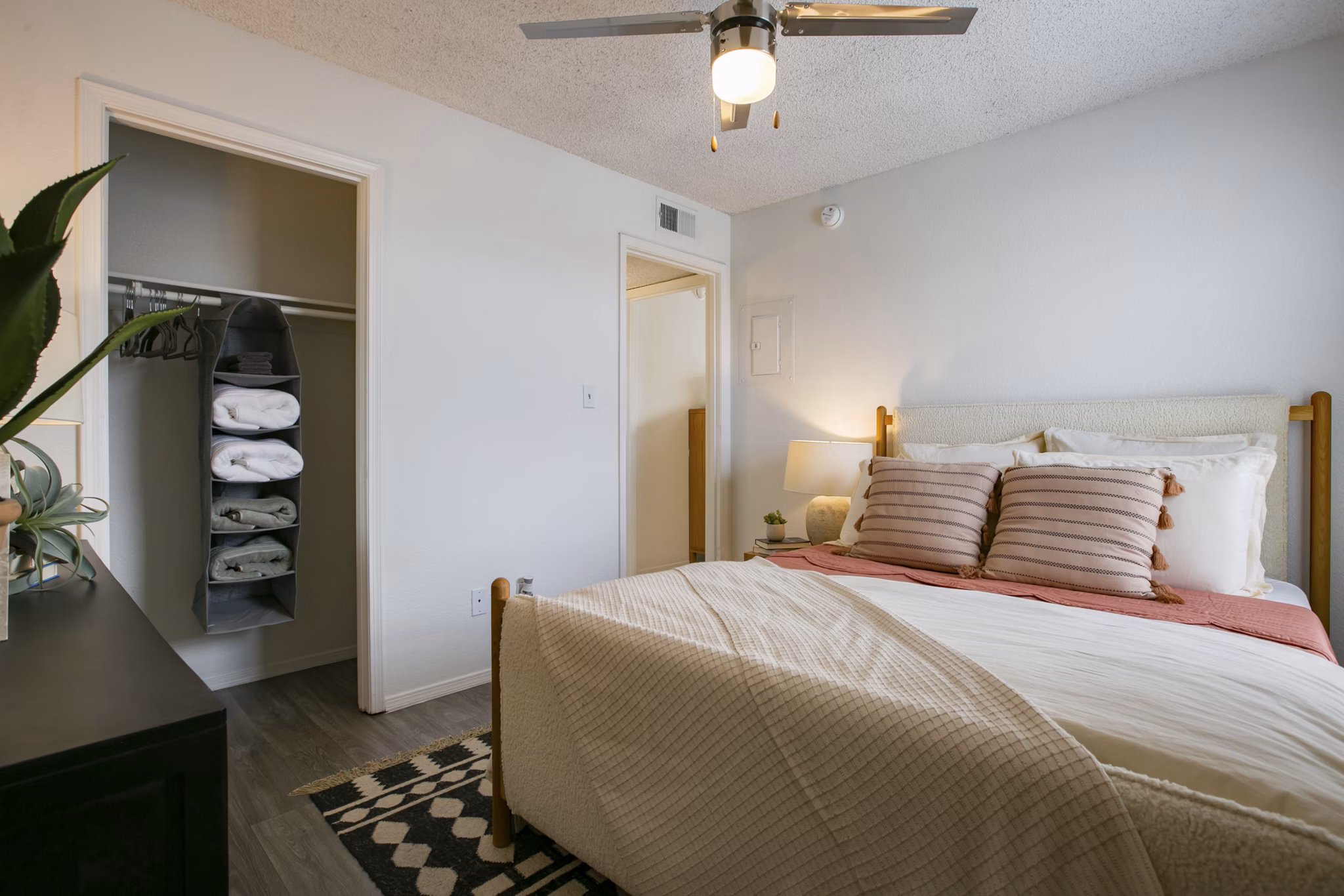 Cozy bedroom with modern design elements at Aydan Apartments: luxury living in the heart of the city