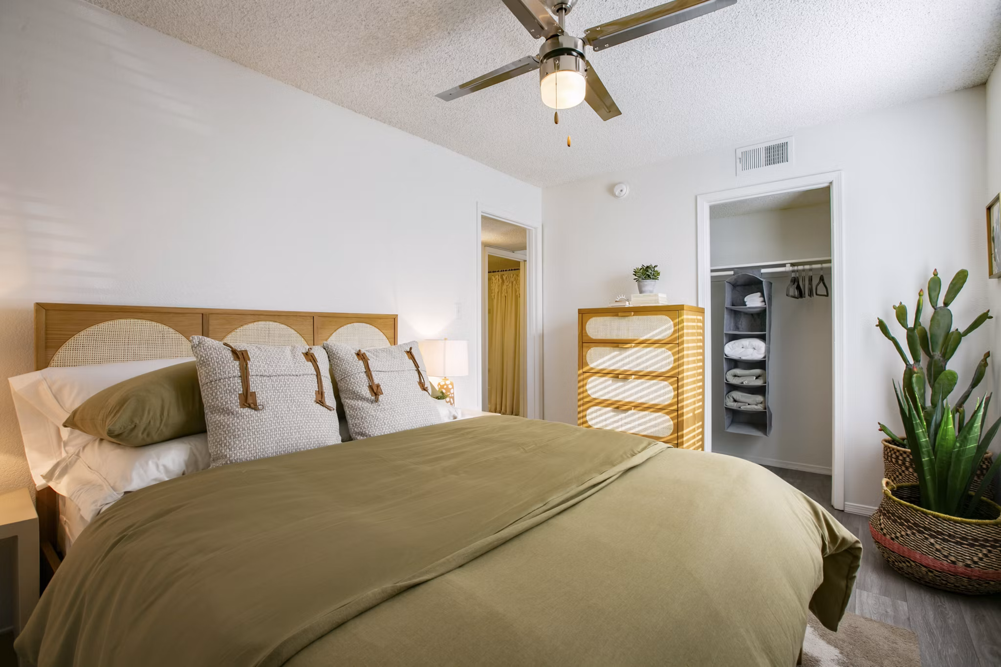 Modern bedroom featuring elegant dÃ©cor and large windows in Aydan Apartments