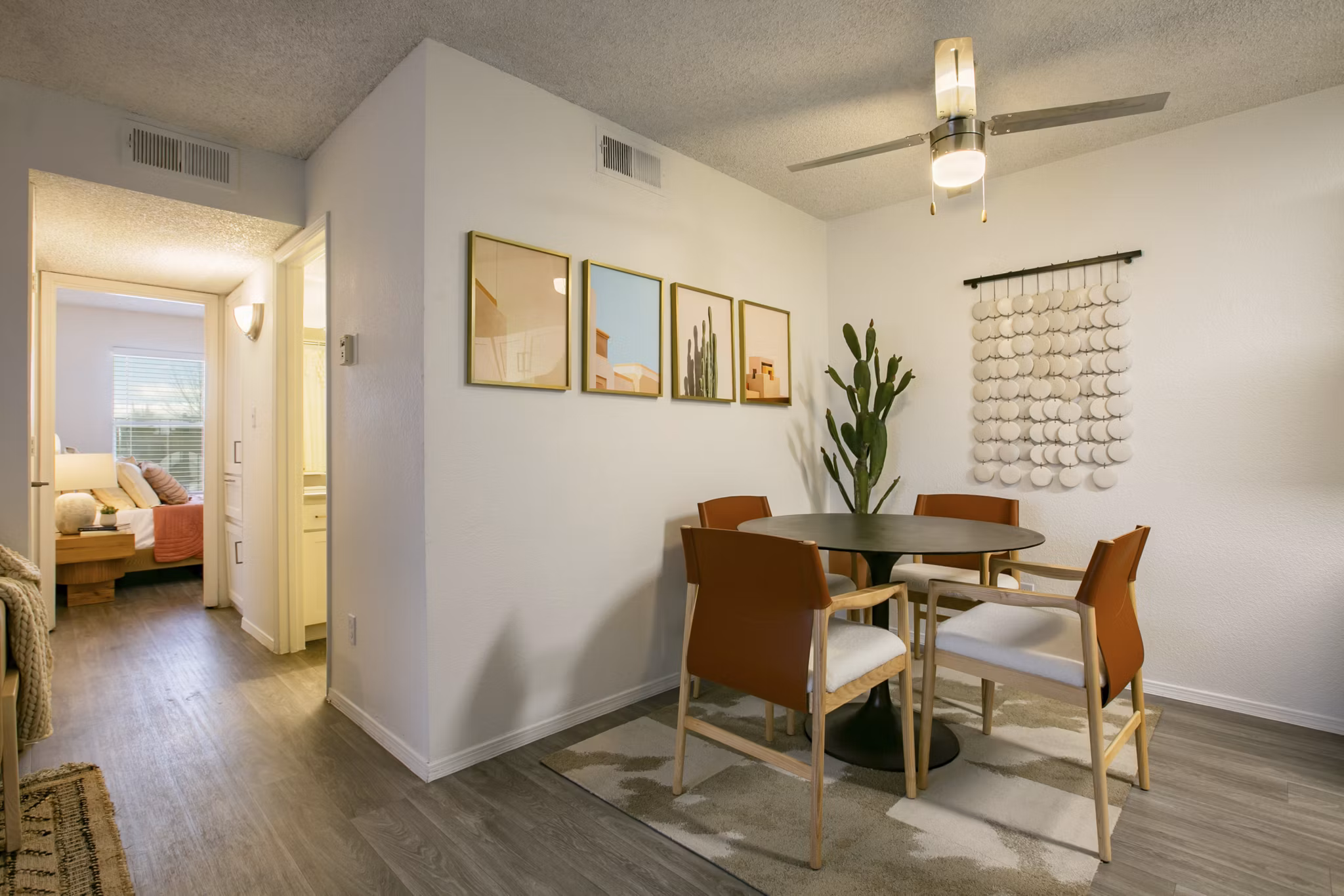 Contemporary dining area with elegant lighting and sleek furniture at Aydan Apartments luxury living
