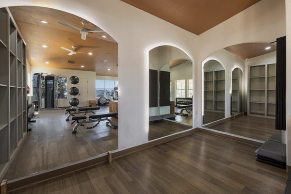 State-of-the-art fitness center featuring modern equipment at Aydan Apartments