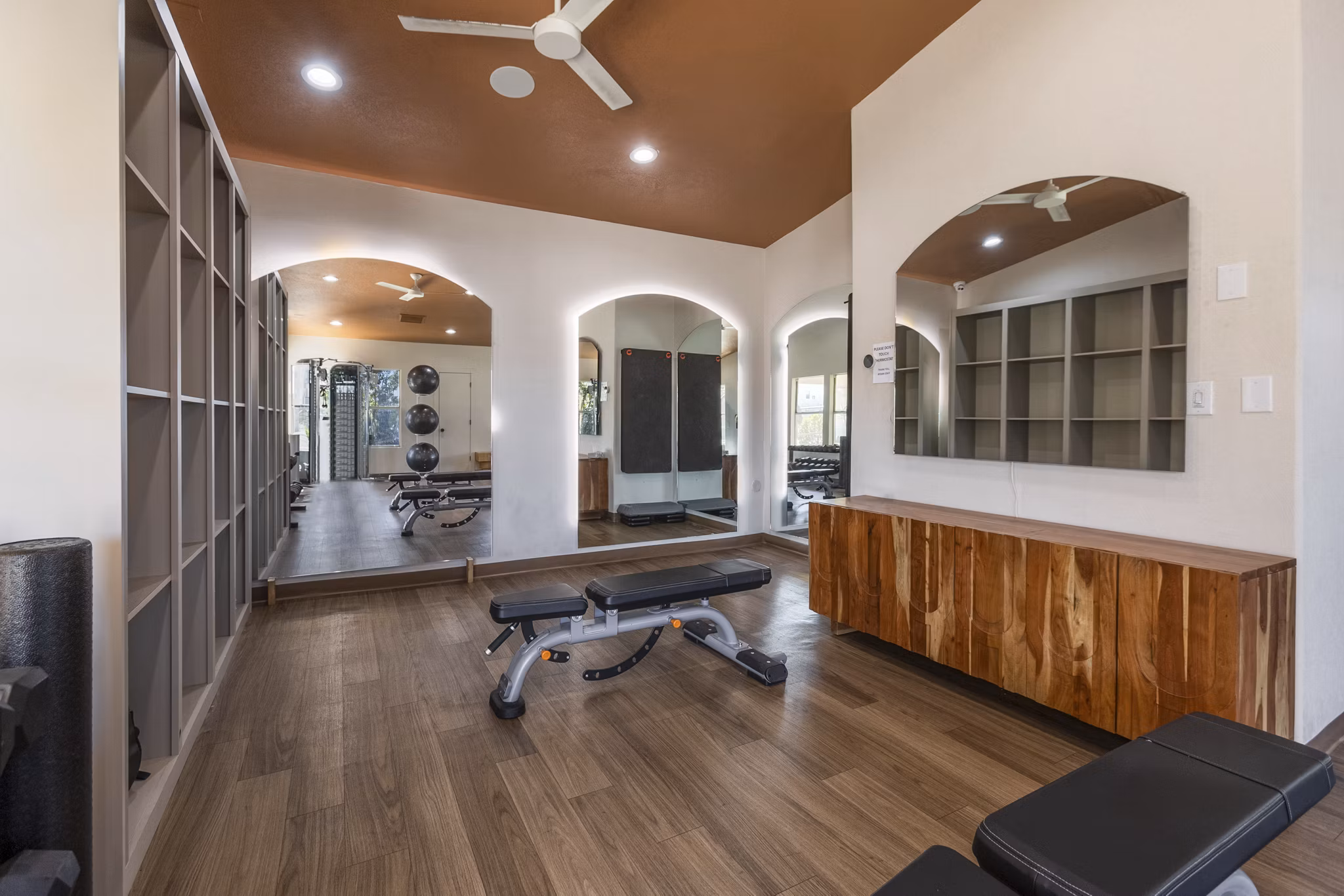Modern fitness center featuring state-of-the-art equipment at Aydan Apartments luxury community