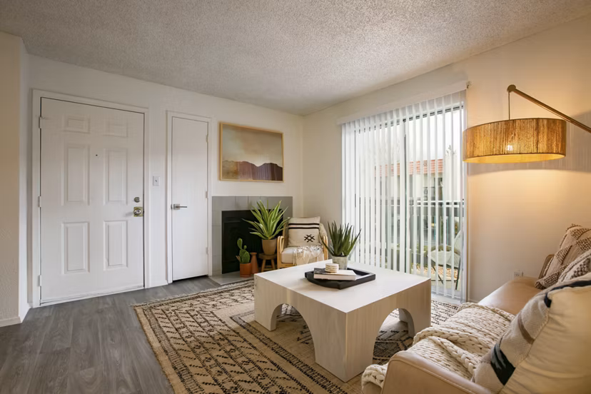Spacious living room with modern decor in Aydan Apartments