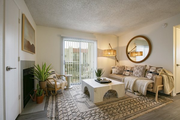 Spacious living room with modern decor at Aydan Apartments