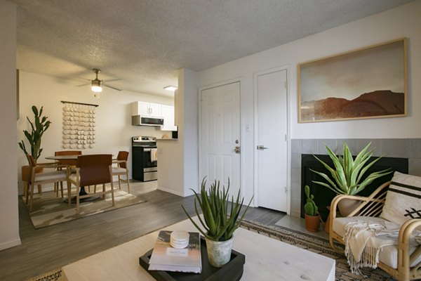 Living room with modern furnishings at Aydan Apartments