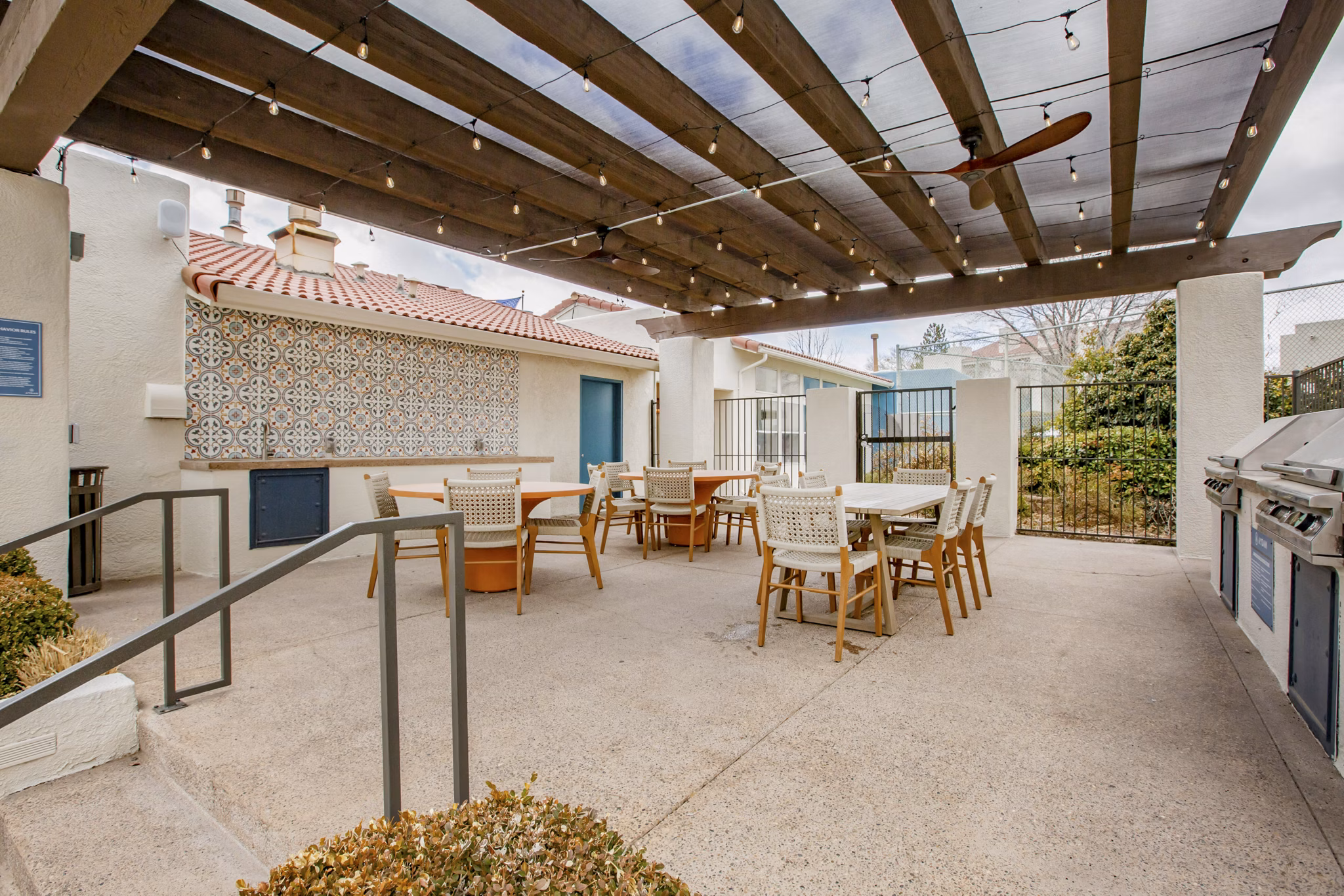 Outdoor grilling and dining area at Aydan Apartments