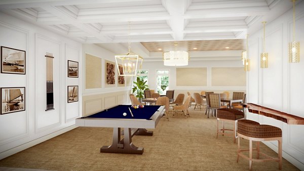 Clubhouse featuring modern design and seating areas at Vistas of Port Jefferson, a luxury apartment community
