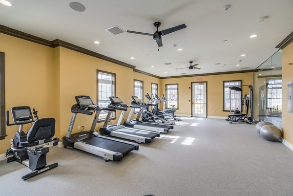 Modern fitness center with state-of-the-art equipment at Vistas of Port Jefferson Apartments