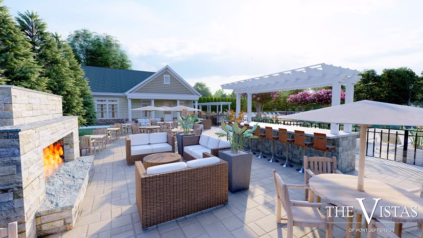 Courtyard with lush greenery at Vistas of Port Jefferson Apartments