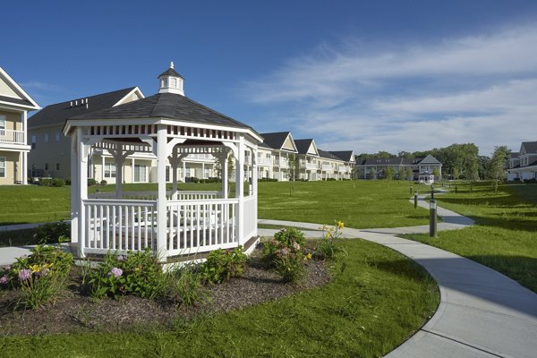 Vistas of Port Jefferson: Charming landscaped courtyard at luxury apartments in Port Jefferson
