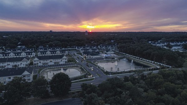 View from Vistas of Port Jefferson: Luxury apartment community with lush landscapes and modern architecture in Port Jefferson