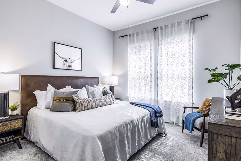 Modern bedroom with sleek furnishings at Album Mansfield Apartments