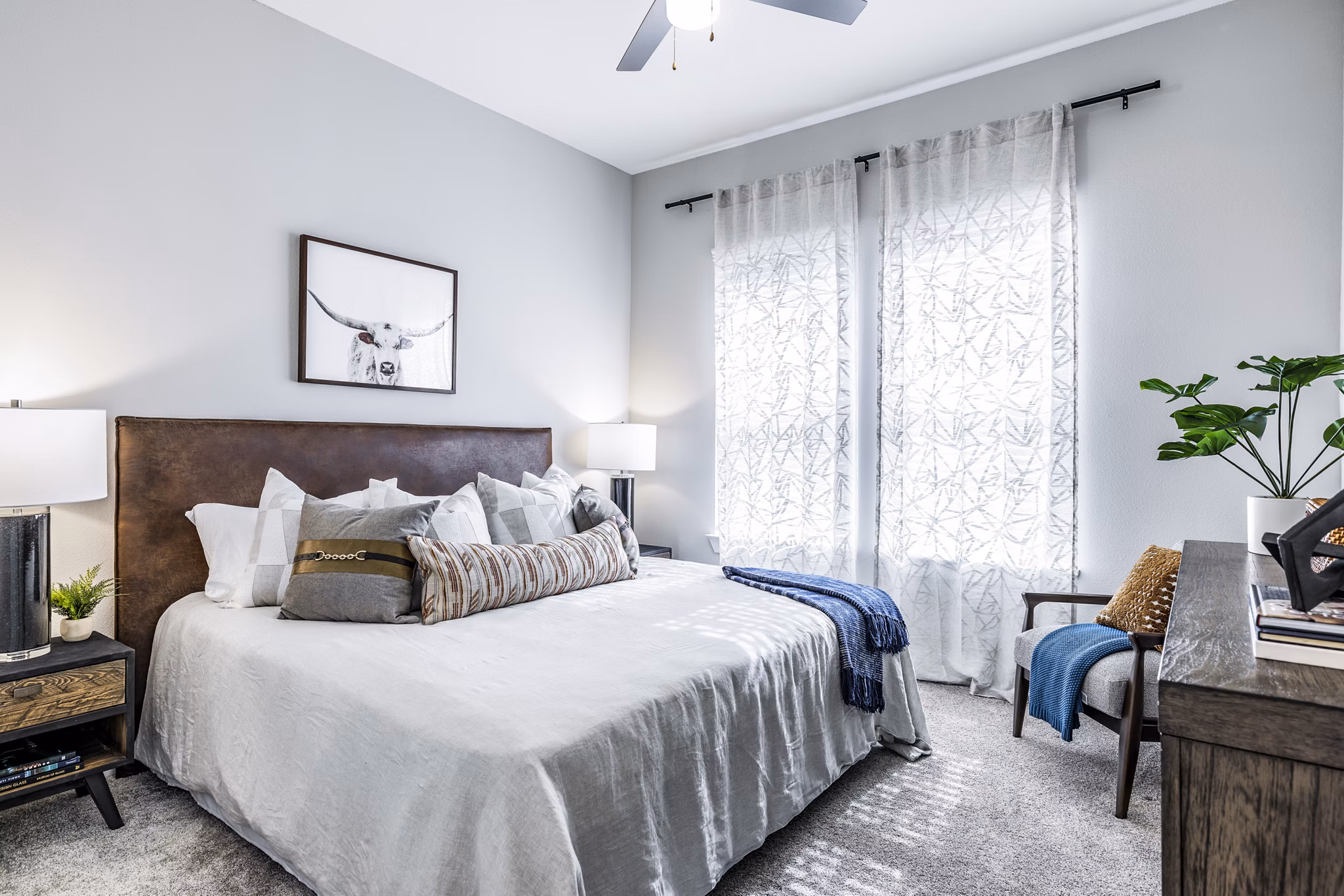 Modern bedroom with sleek furnishings at Album Mansfield Apartments