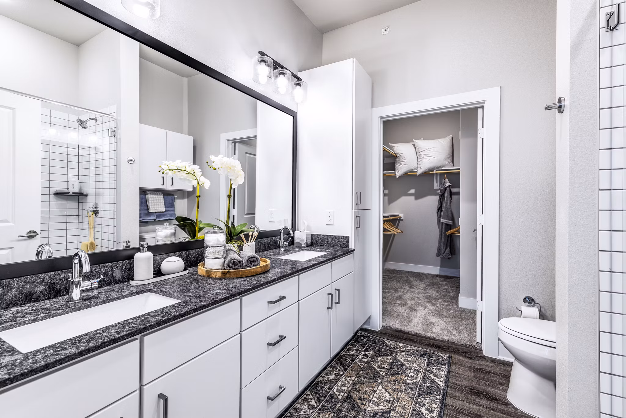 Modern bathroom with elegant fixtures at Album Mansfield Apartments offering luxury living