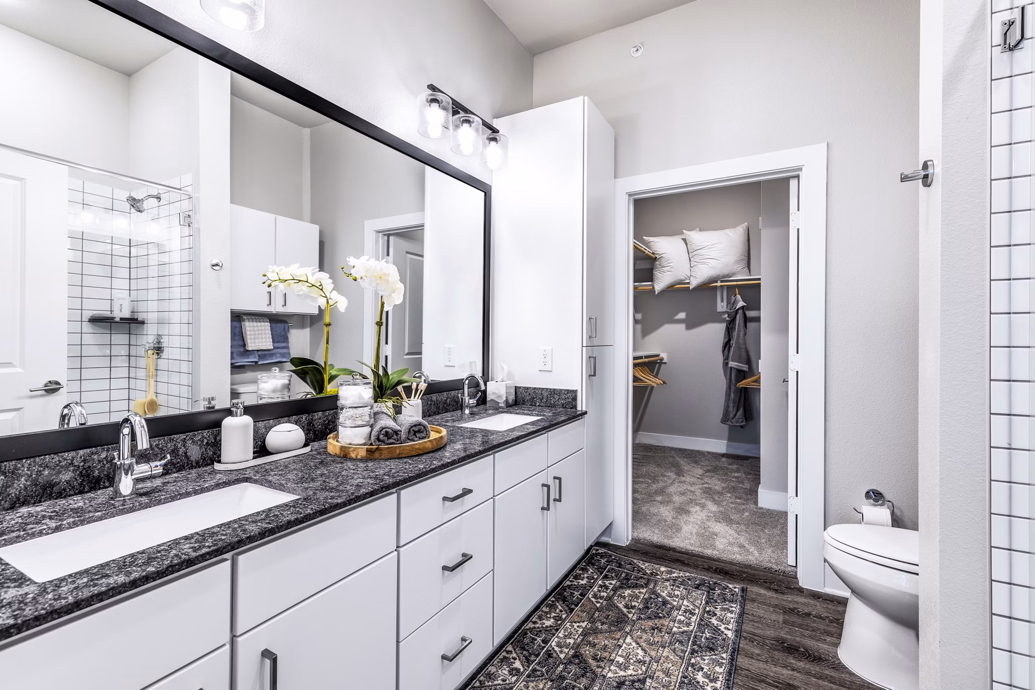 Modern bathroom with elegant fixtures at Album Mansfield Apartments offering luxury living