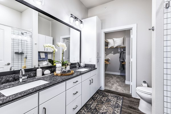 Modern bathroom with elegant fixtures at Album Mansfield Apartments offering luxury living