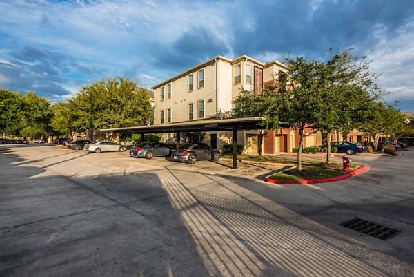 covered parking at Oasis at Piney Point Apartments