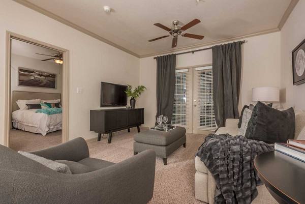 living room at Oasis at Piney Point Apartments