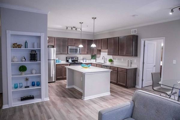 living room at Oasis at Piney Point Apartments