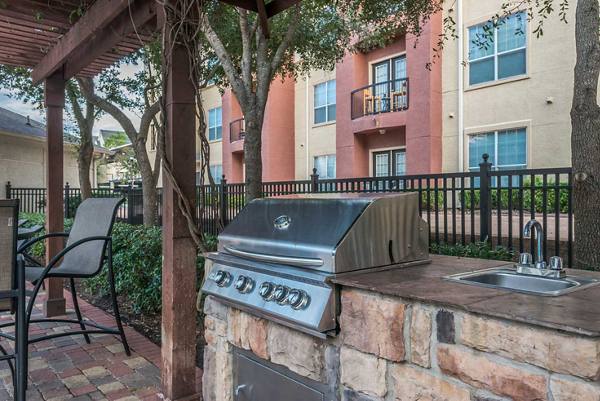 grill area at Oasis at Piney Point Apartments