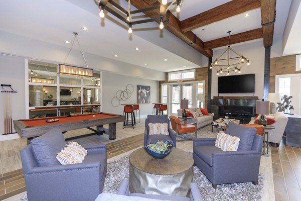 Clubhouse with modern design at The Lodges on English Station Rd Apartments, offering a luxurious amenity space for residents