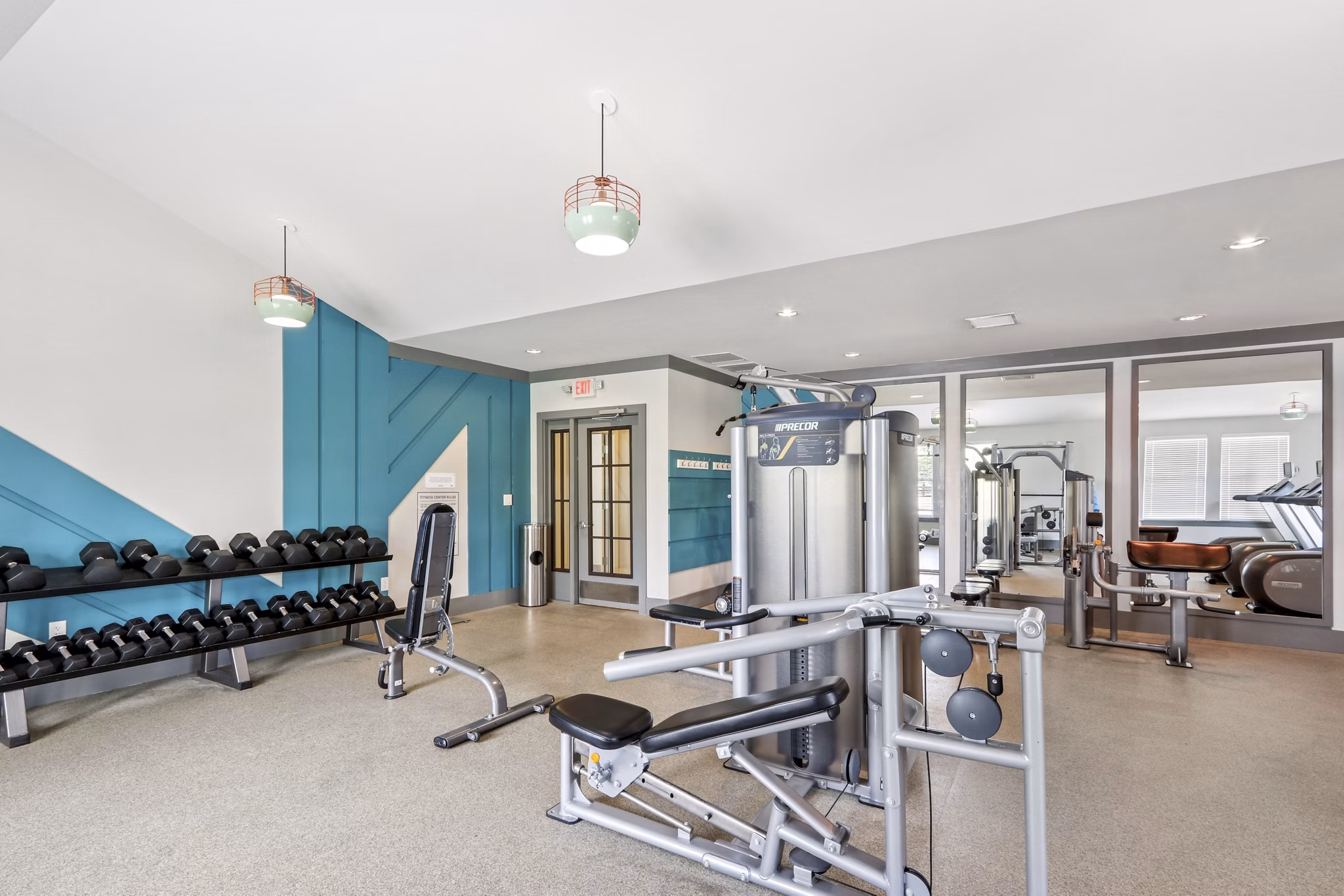 fitness center at The Lodges on English Station Rd. Apartments