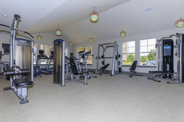 fitness center at The Lodges on English Station Rd Apartments