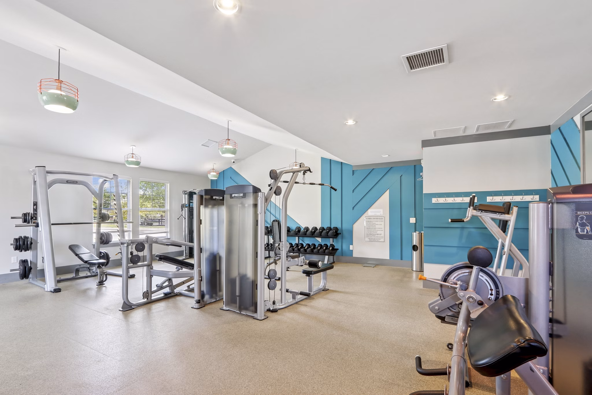 fitness center at The Lodges on English Station Rd. Apartments
