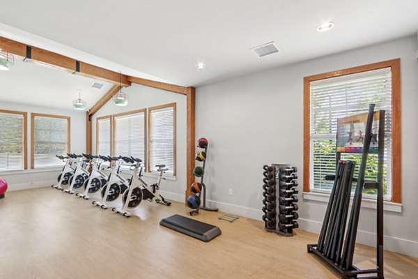 fitness center at The Lodges on English Station Rd. Apartments