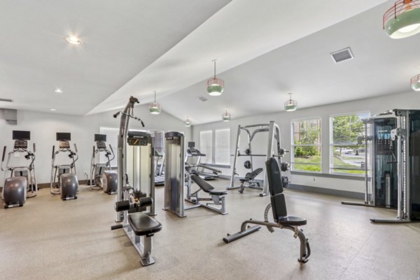 fitness center at The Lodges on English Station Rd. Apartments