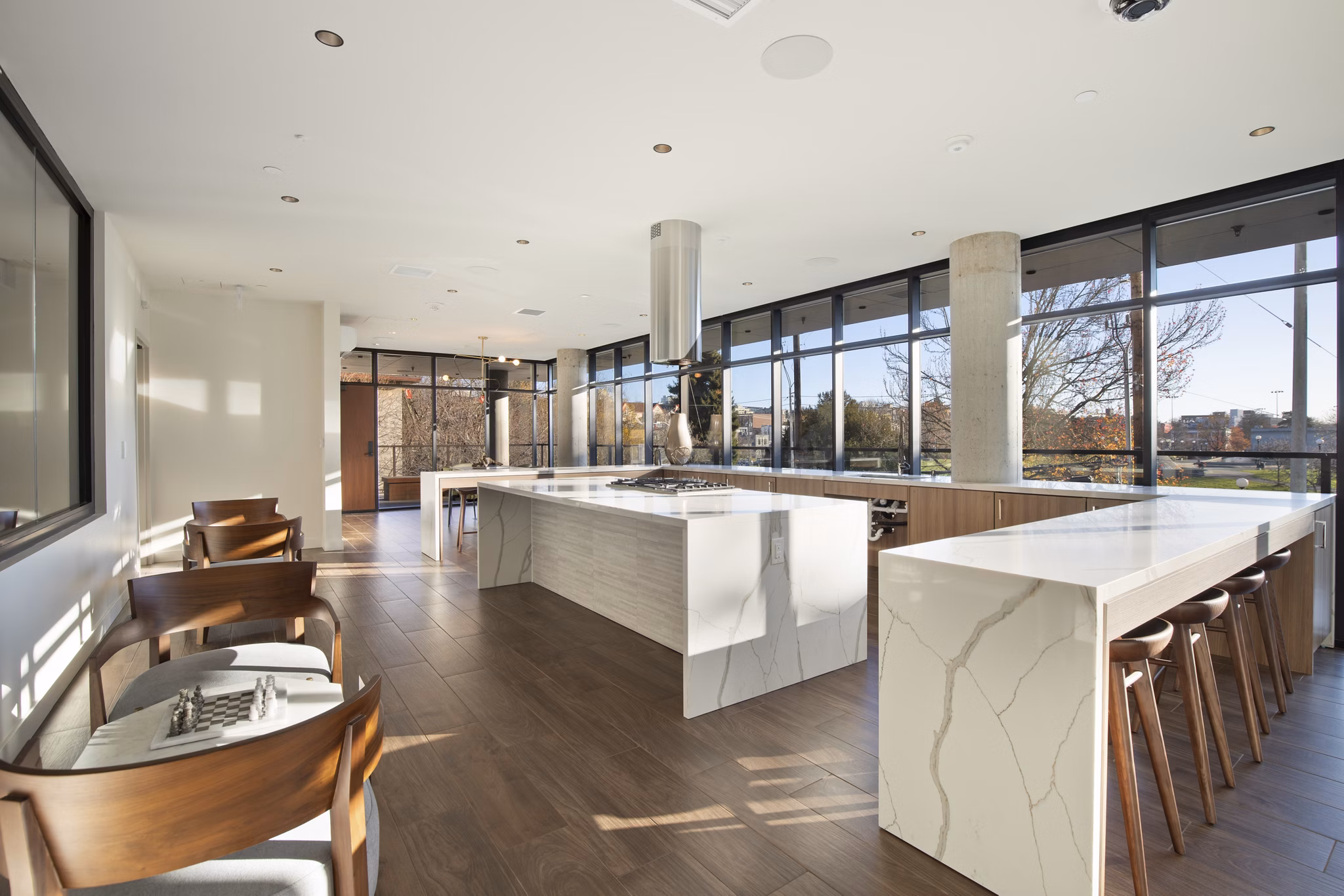 Clubhouse featuring modern lounge areas at Connection on Broadway Apartments