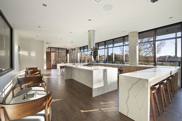 Clubhouse featuring modern lounge areas at Connection on Broadway Apartments