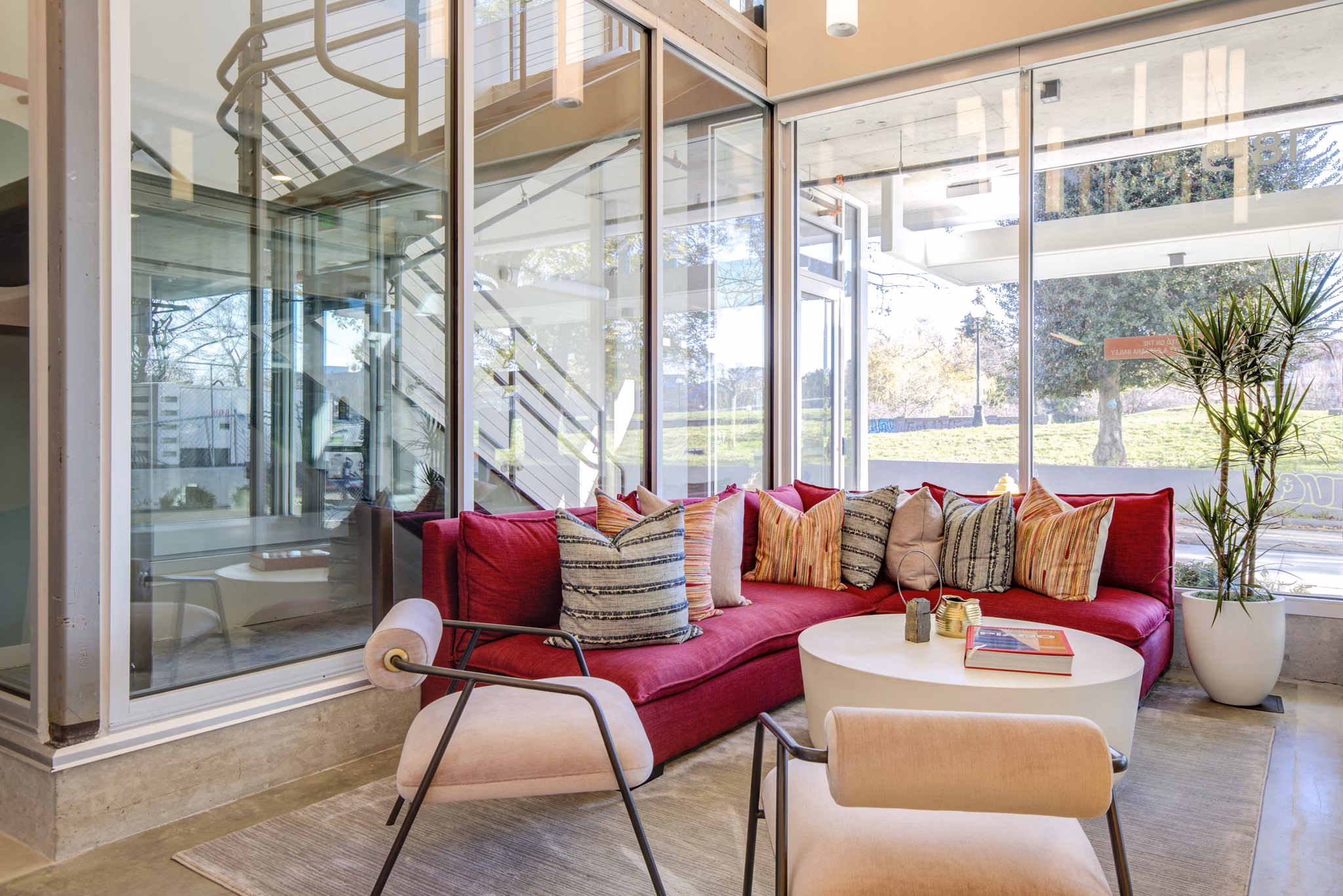 Clubhouse featuring modern design and lounge seating at Connection on Broadway Apartments