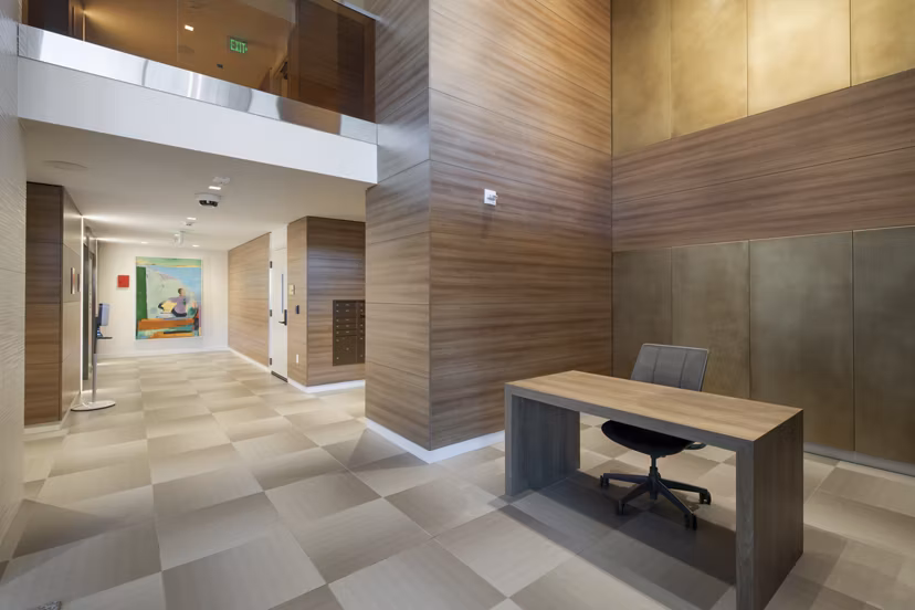 Clubhouse featuring modern seating and entertainment areas at Connection on Broadway Apartments