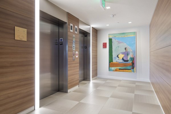 Clubhouse featuring stylish seating and modern decor at Connection on Broadway Apartments