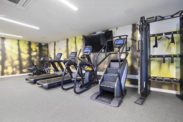 State-of-the-art fitness center at Capitol Hill Station Apartments with modern equipment and spacious workout areas