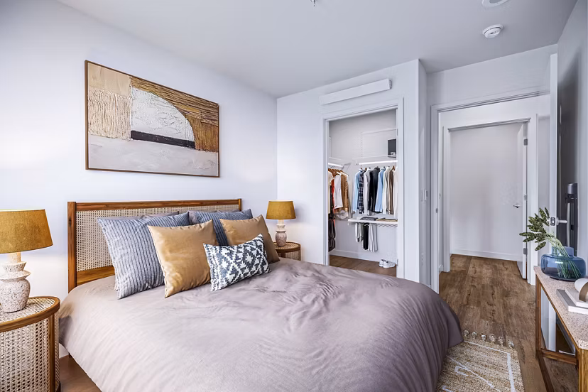 Modern bedroom with stylish decor at Connection on Broadway Apartments in Seattle