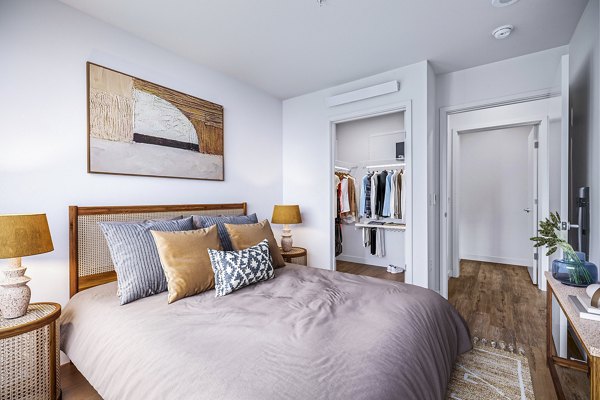 Modern bedroom with stylish decor at Connection on Broadway Apartments in Seattle