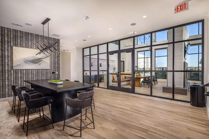 Modern meeting facility with state-of-the-art equipment at Revel Apartments, enhanced for business and social gatherings