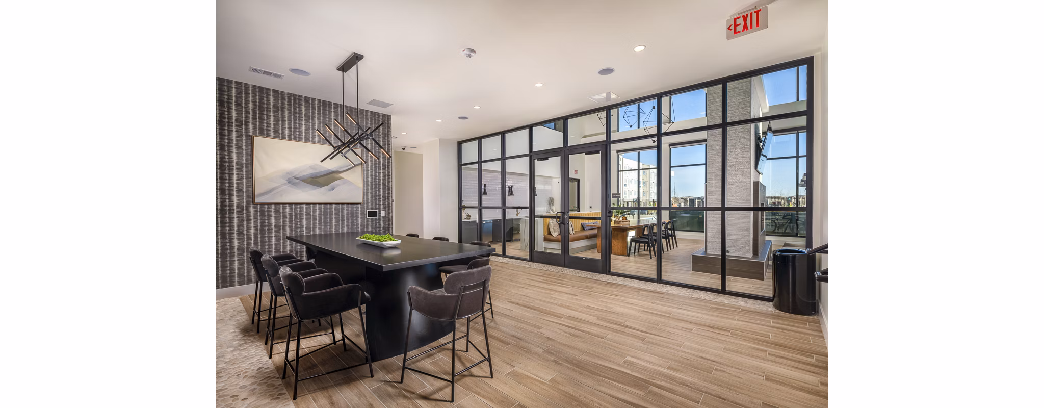 Modern meeting facility with state-of-the-art equipment at Revel Apartments, enhanced for business and social gatherings