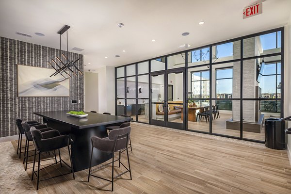 Modern meeting facility with state-of-the-art equipment at Revel Apartments, enhanced for business and social gatherings