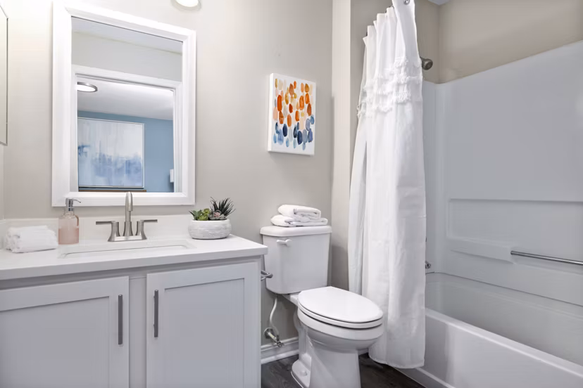 Modern bathroom with sleek fixtures in 403 West TEST Apartments, luxury living in a prime location