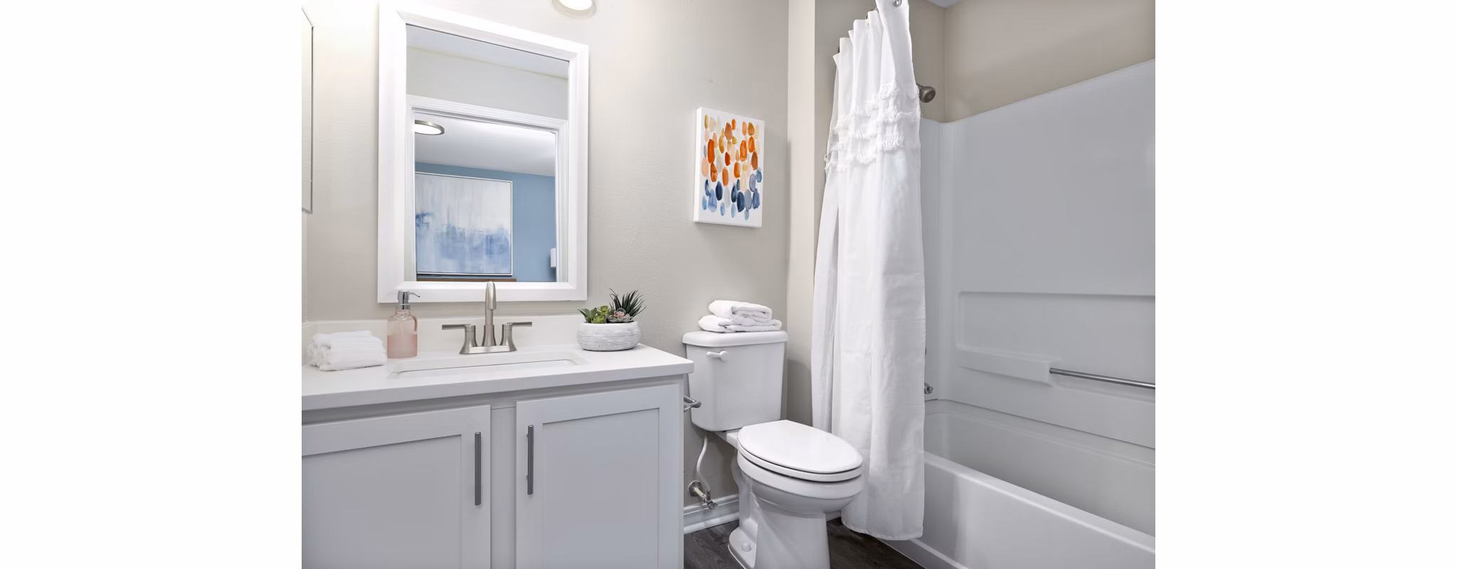 Modern bathroom with sleek fixtures in 403 West TEST Apartments, luxury living in a prime location