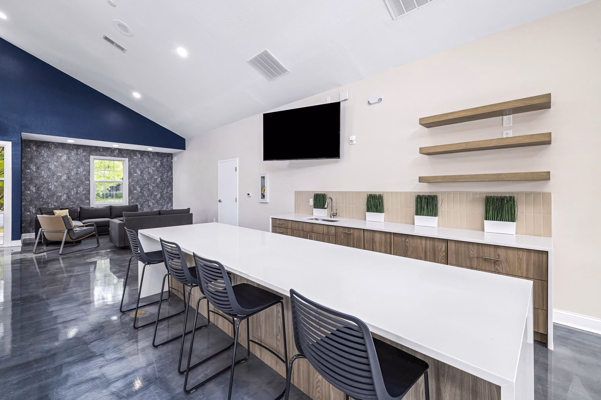Clubhouse with modern design elements at 403 West Apartments, a luxury Greystar property